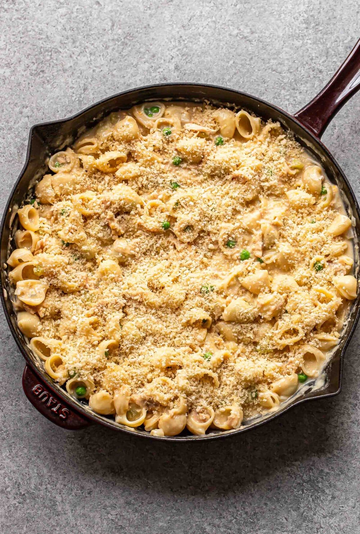 Tuna noodle casserole in a skillet before being baked.