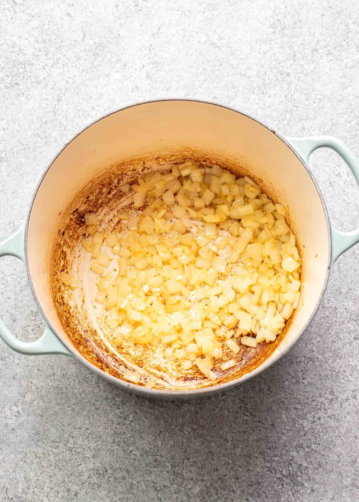 Sauteed onions in a dutch oven.