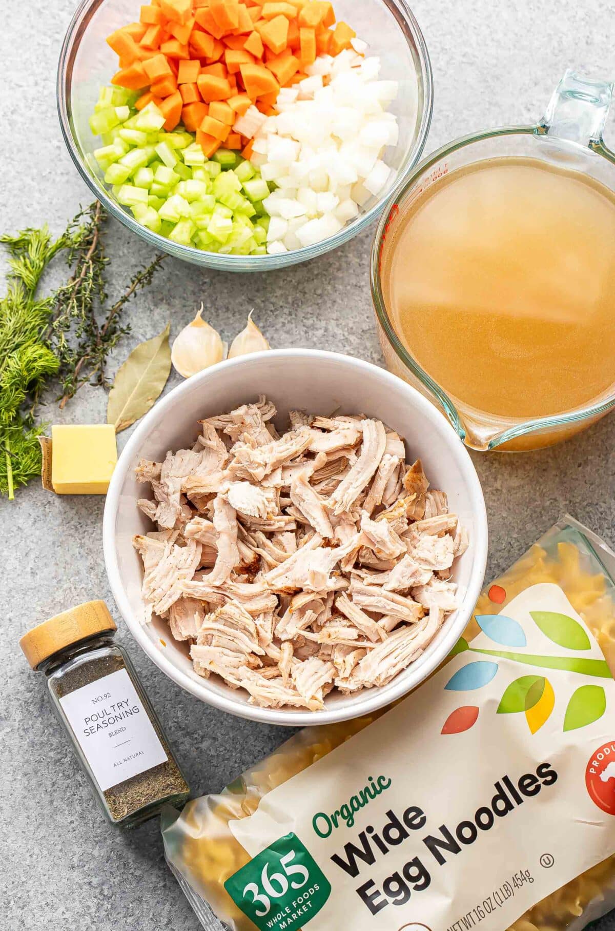 Ingredients used to make turkey noodle soup.