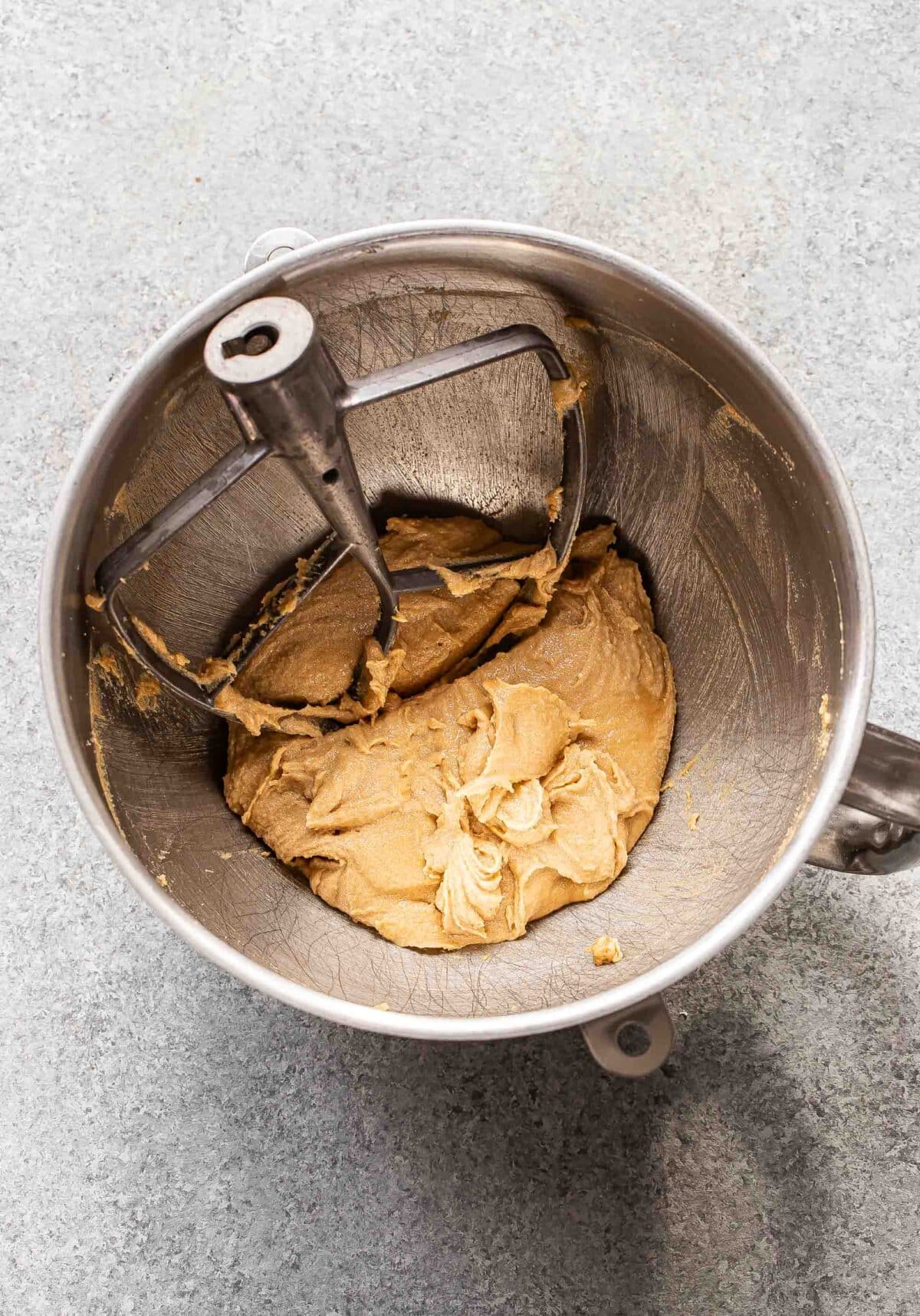 Beaten butter and sugar in a mixing bowl.