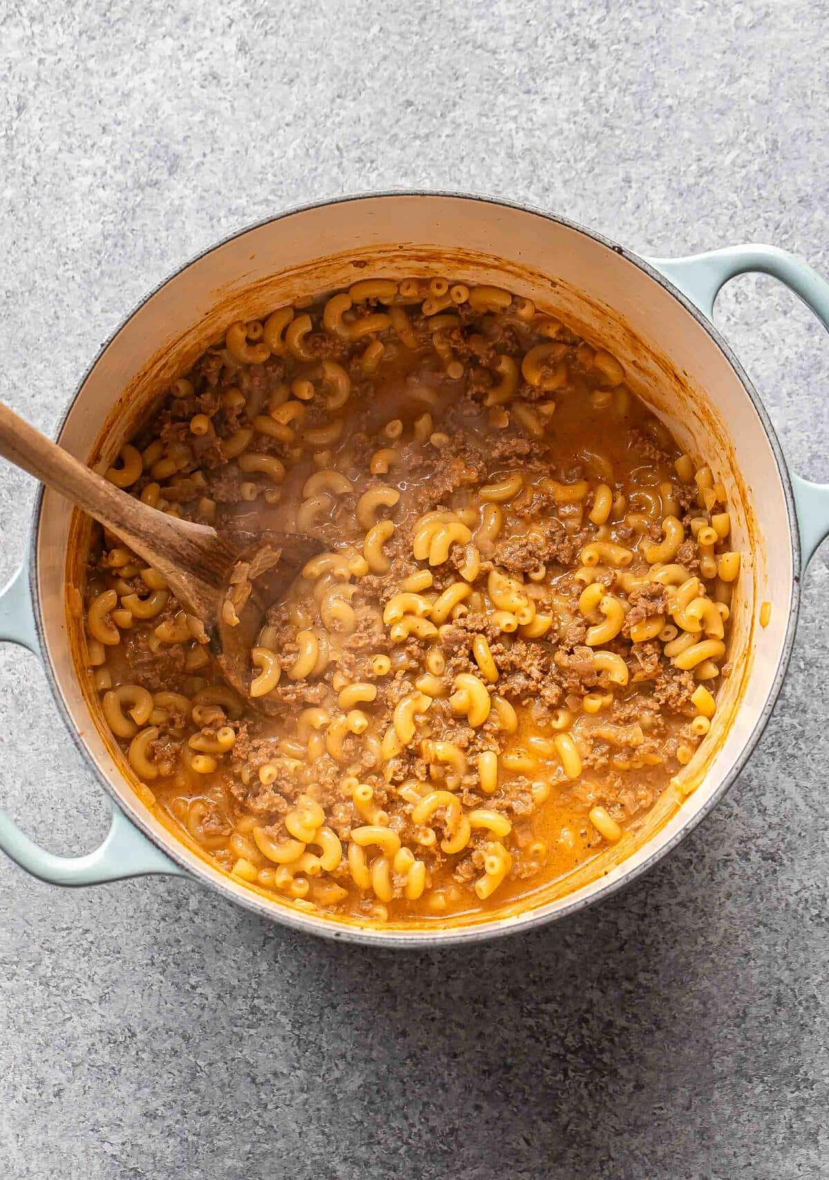 Hamburger helper in a pot before cheese is added in.