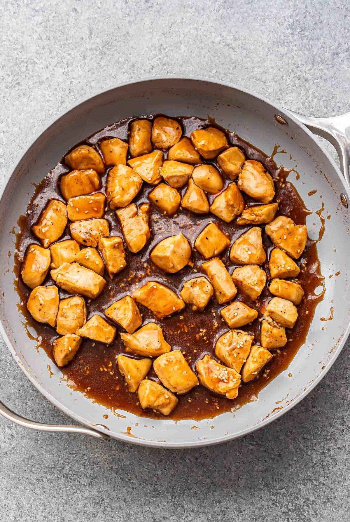 Teriyaki chicken in a skillet.