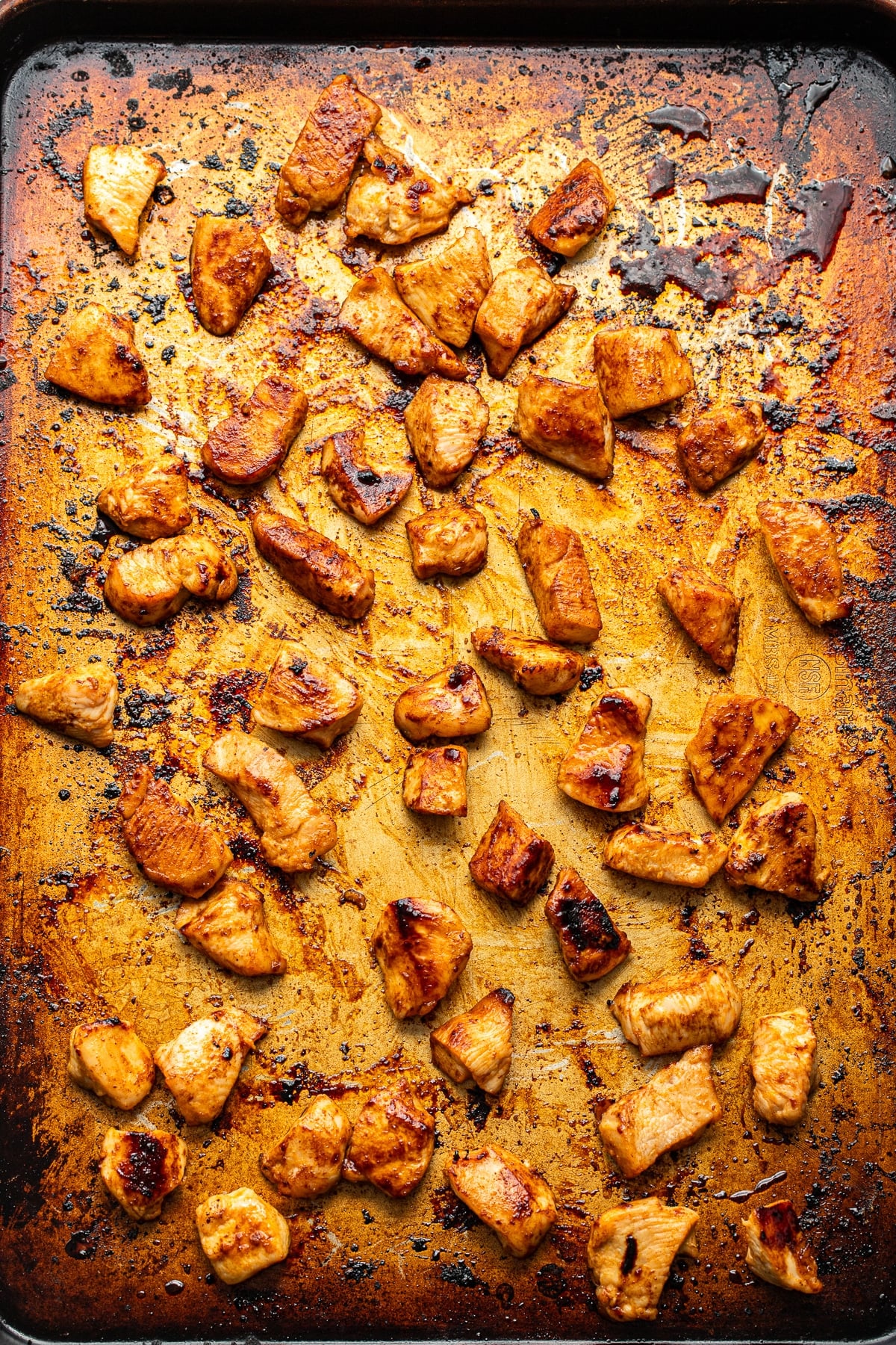 Hot honey chicken on a sheet pan.