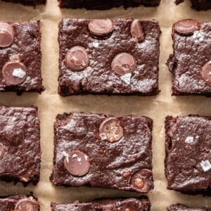 Sweet potato brownies topped with flaky sea salt cut into squares.