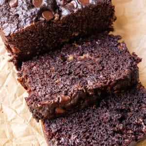 Double chocolate banana bread with 2 slices cut from the loaf.